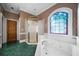 Bathroom with a soaking tub, shower, and stained glass window at 2202 Lattimore Farm Nw Dr, Kennesaw, GA 30152