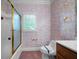 Bathroom featuring a shower and floral wallpaper at 2202 Lattimore Farm Nw Dr, Kennesaw, GA 30152