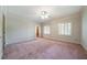 Large bedroom with two windows, ceiling fan and crown molding at 2202 Lattimore Farm Nw Dr, Kennesaw, GA 30152