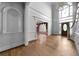 Grand foyer with hardwood floors, high ceilings, and access to multiple living spaces at 2202 Lattimore Farm Nw Dr, Kennesaw, GA 30152