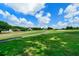 Scenic view of the golf course and neighborhood at 2202 Lattimore Farm Nw Dr, Kennesaw, GA 30152
