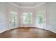 Cozy nook with hardwood floors, three doors with louvered blinds, and white trim at 2202 Lattimore Farm Nw Dr, Kennesaw, GA 30152