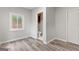 Cozy bedroom with new floors, closet space and ensuite bathroom entrance at 2544 Overlook Dr, Atlanta, GA 30344