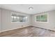 Bright bedroom with wood floors, neutral walls, and lots of natural light at 2544 Overlook Dr, Atlanta, GA 30344