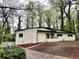 Charming single-story home with a brick exterior, updated landscaping, and a welcoming front porch at 2544 Overlook Dr, Atlanta, GA 30344
