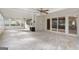 Bright sun room boasts abundant natural light, brick walls, and tile flooring at 2544 Overlook Dr, Atlanta, GA 30344