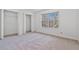 Spacious, bright bedroom with a closet and neutral carpet at 2209 N Forest Trl, Atlanta, GA 30338