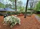 Community picnic area features outdoor seating, a BBQ grill, and lush landscaping creating a welcoming social space at 2209 N Forest Trl, Atlanta, GA 30338