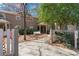 Charming townhouse with a walkway leading to the front door and a white bench at 2209 N Forest Trl, Atlanta, GA 30338