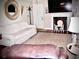 Inviting living room with a white sofa, area rug, and a decorative fireplace at 4017 S South Bogan Road Rd, Buford, GA 30519