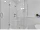 Modern tiled shower with glass door and built in bench at 211 Colonial Homes Nw Dr # 1102, Atlanta, GA 30309