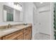 Well-lit bathroom featuring a modern vanity and walk-in shower at 211 Colonial Homes Nw Dr # 1102, Atlanta, GA 30309