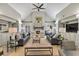 Bright, airy living room with vaulted ceilings, fireplace, built-ins, and stylish furnishings for comfortable living at 211 Colonial Homes Nw Dr # 1102, Atlanta, GA 30309