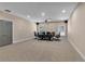 Carpeted meeting room featuring a projector, drop ceiling and table with executive chairs at 211 Colonial Homes Nw Dr # 1102, Atlanta, GA 30309