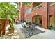 A lovely patio area with an outdoor dining table and cozy seating, perfect for relaxing or entertaining at 211 Colonial Homes Nw Dr # 1102, Atlanta, GA 30309