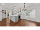 Bright eat-in kitchen with stainless appliances, white cabinets, and hardwood floors at 2983 Albright Nw Commons, Kennesaw, GA 30144