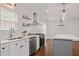 Beautiful kitchen with stainless steel appliances and modern white cabinets and fixtures at 2983 Albright Nw Commons, Kennesaw, GA 30144