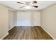 Bedroom features hardwood floors, closet space, ceiling fan, and neutral color walls at 2992 Parc Lorraine, Lithonia, GA 30038