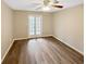 Bedroom with ceiling fan, hardwood floors and french doors at 2992 Parc Lorraine, Lithonia, GA 30038