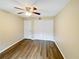 Bedroom features hardwood floors, closet space, ceiling fan, and neutral color walls at 2992 Parc Lorraine, Lithonia, GA 30038
