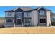 Elegant two-story brick home boasts stone accents, large windows, and manicured lawn at 3063 Reserve Ct Sw, Conyers, GA 30094