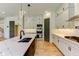 Well-equipped kitchen features marble counters, central island, and custom cabinetry at 3063 Reserve Ct Sw, Conyers, GA 30094