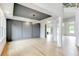 Stylish living room featuring hardwood floors, modern lighting, and architectural details at 3063 Reserve Ct Sw, Conyers, GA 30094
