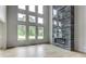 Stunning living room with soaring ceilings, large windows, and sleek fireplace at 3063 Reserve Ct Sw, Conyers, GA 30094
