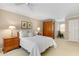 Bedroom with ceiling fan, carpet floors, wood furniture, and two pictures on the wall at 1508 Brianwood Rd # 1508, Decatur, GA 30033