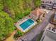 Aerial view of a clean community pool surrounded by lounge chairs and lush greenery at 1508 Brianwood Rd # 1508, Decatur, GA 30033