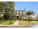 Charming brick house featuring a well-manicured lawn, mature landscaping, and a classic architectural style at 1508 Brianwood Rd # 1508, Decatur, GA 30033
