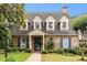 Charming brick home with dormer windows, a walkway, and professionally landscaped yard at 1508 Brianwood Rd # 1508, Decatur, GA 30033