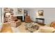 Comfortable living room with fireplace, built-in bookshelves, and an area rug at 1508 Brianwood Rd # 1508, Decatur, GA 30033