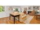 Bright living room featuring hardwood floors, built-in shelves, and ample natural light at 1508 Brianwood Rd # 1508, Decatur, GA 30033