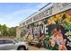 Oak Grove Market storefront featuring a colorful mural at 1508 Brianwood Rd # 1508, Decatur, GA 30033