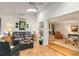 Bright sunroom featuring a skylight, ceiling fan, and easy access to other living spaces, perfect for relaxing and entertaining at 1508 Brianwood Rd # 1508, Decatur, GA 30033