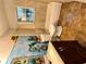 Bathroom with tiled floors, cartoon art, a window, toilet, and vanity at 1846 North Ave, Atlanta, GA 30318