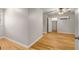Neutral bedroom with a ceiling fan and hardwood floors at 229 Devonwood Dr, Atlanta, GA 30328