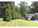 Inviting front yard with manicured lawn and mature landscaping at 229 Devonwood Dr, Atlanta, GA 30328