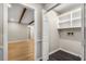 Convenient laundry room with built-in shelving for storage at 229 Devonwood Dr, Atlanta, GA 30328