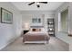 Cozy bedroom with soft carpet, a comfortable bed, and natural light from the window at 1101 Juniper Ne St # 619, Atlanta, GA 30309