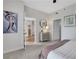 Bedroom featuring soft carpet, a bureau, and art on the walls at 1101 Juniper Ne St # 619, Atlanta, GA 30309