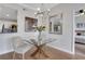 Dining area with glass top table with views into kitchen and bedroom at 1101 Juniper Ne St # 619, Atlanta, GA 30309