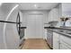 Kitchen featuring stainless steel appliances, plenty of counter space and white cabinets at 1101 Juniper Ne St # 619, Atlanta, GA 30309