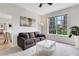 Comfortable living area with lots of natural light and city views from a large window at 1101 Juniper Ne St # 619, Atlanta, GA 30309
