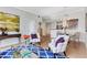 Open living and dining area featuring hardwood floors and view to the kitchen at 1101 Juniper Ne St # 619, Atlanta, GA 30309