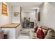 Cozy basement space featuring a wooden bench, concrete walls, and home office setup at 132 Lakeshore Dr, Roswell, GA 30075