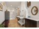 Spa-like bathroom with double sinks, a walk-in shower, and modern finishes at 132 Lakeshore Dr, Roswell, GA 30075