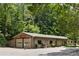 Photograph of a fire department building surrounded by lush greenery at 132 Lakeshore Dr, Roswell, GA 30075