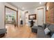Open-concept living room features wood floors, natural light, and an open doorway at 132 Lakeshore Dr, Roswell, GA 30075